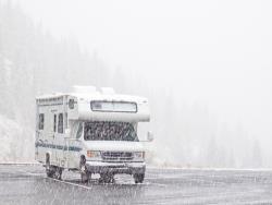 RV parked in a snowstorm